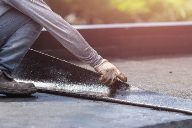 Professional Emergency Waterproofing technician working in Burlington, NJ